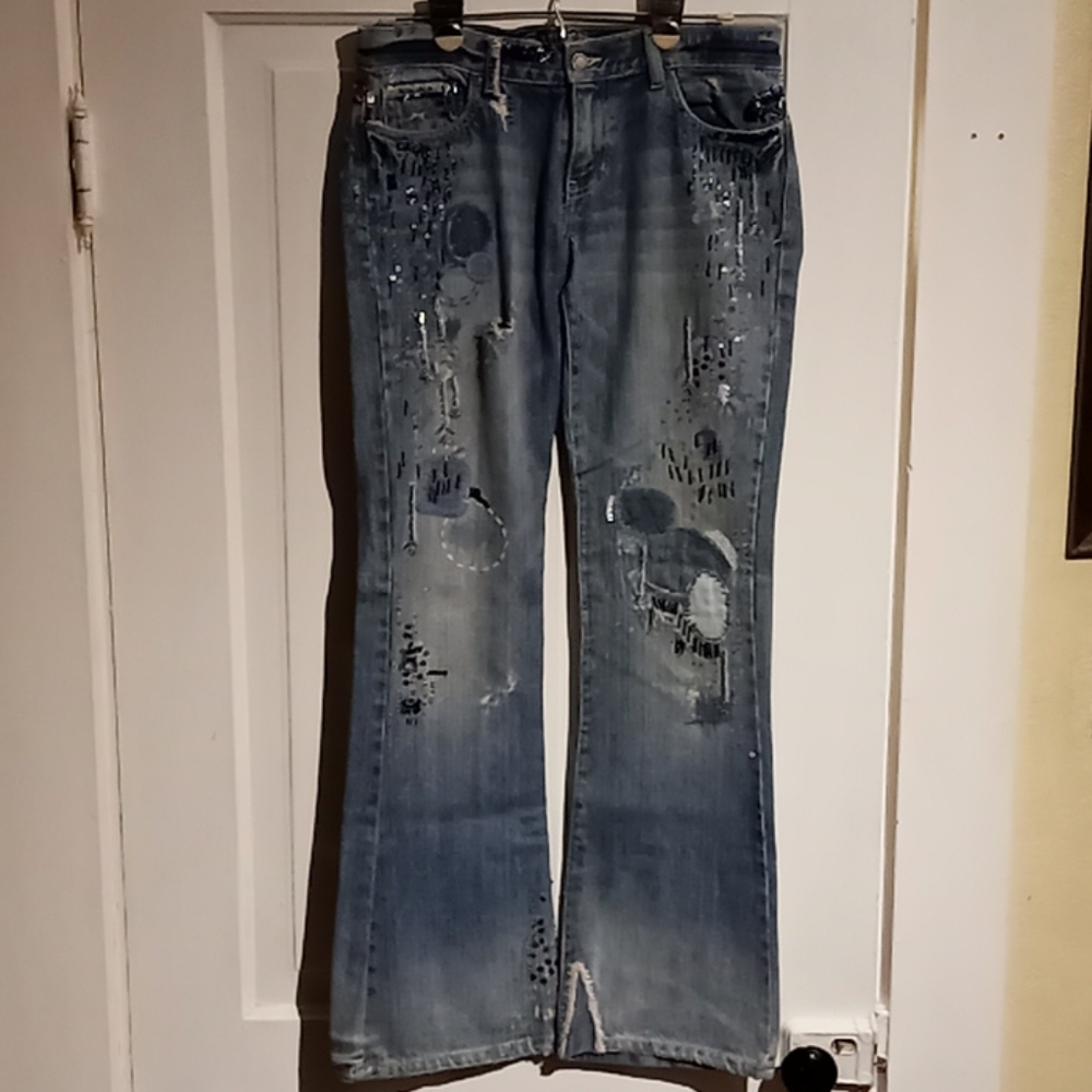 Size M 26. Flare bottom Ezra Fitch beaded detail